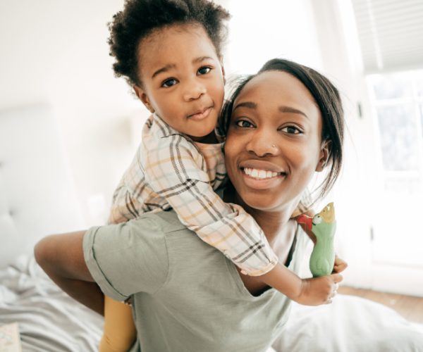 happy adult female with child